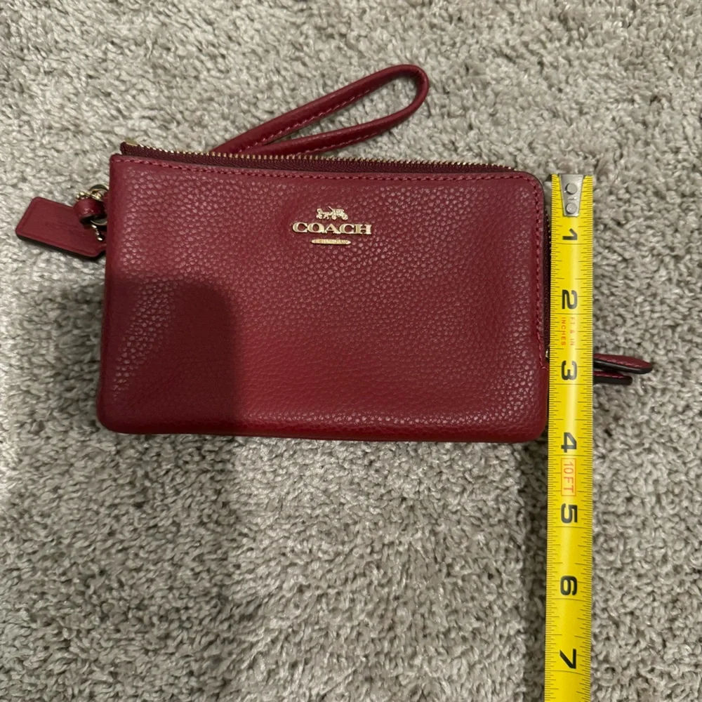 Like 🆕 Coach saturated magenta mini wristlet wallet pouch